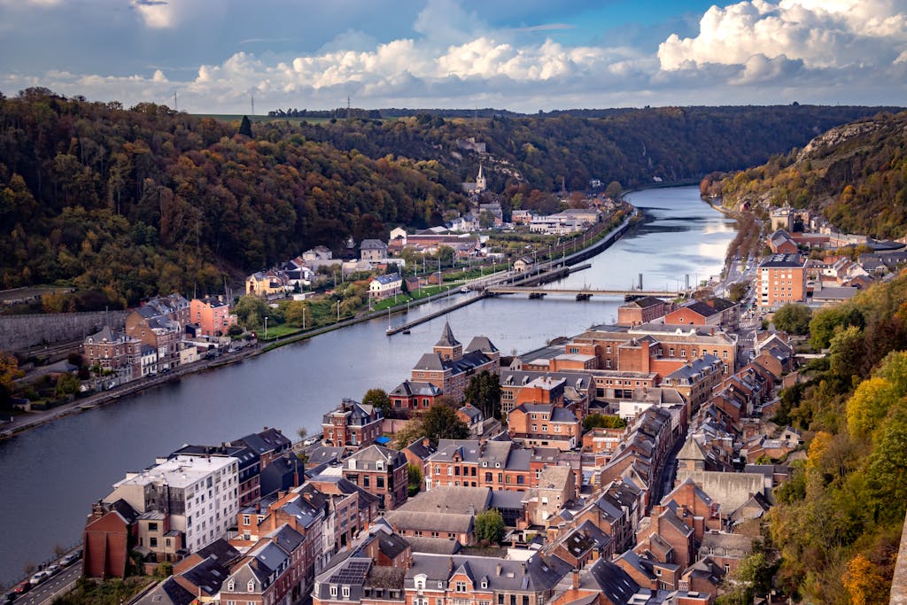 Breathtaking aerial view of Dinant with the Meuse River winding through Wallonia, Belgium.